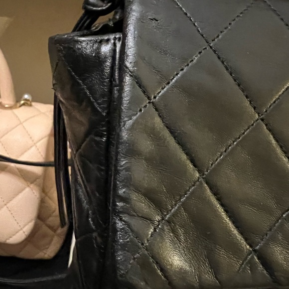 CHANEL Black Quilted Backpack with Gold Logo - Picture 4 of 16